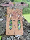 Green & Purple Peacock Feather Drop Earrings by OGIMAAKWE-AMANDA