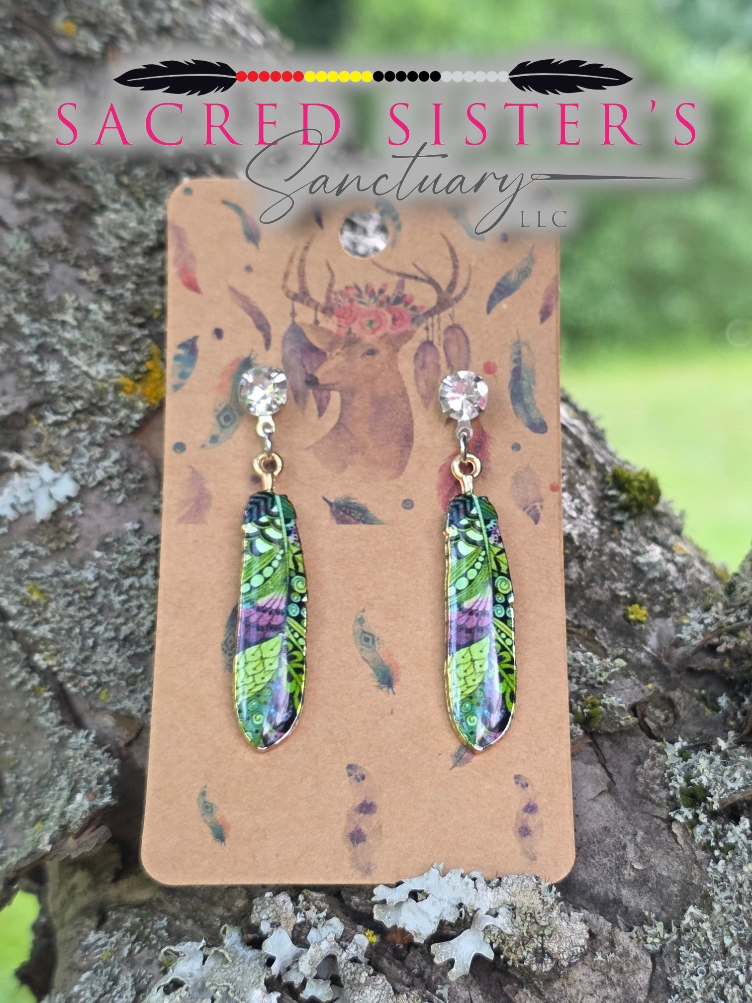 Green & Purple Peacock Feather Drop Earrings by OGIMAAKWE-AMANDA